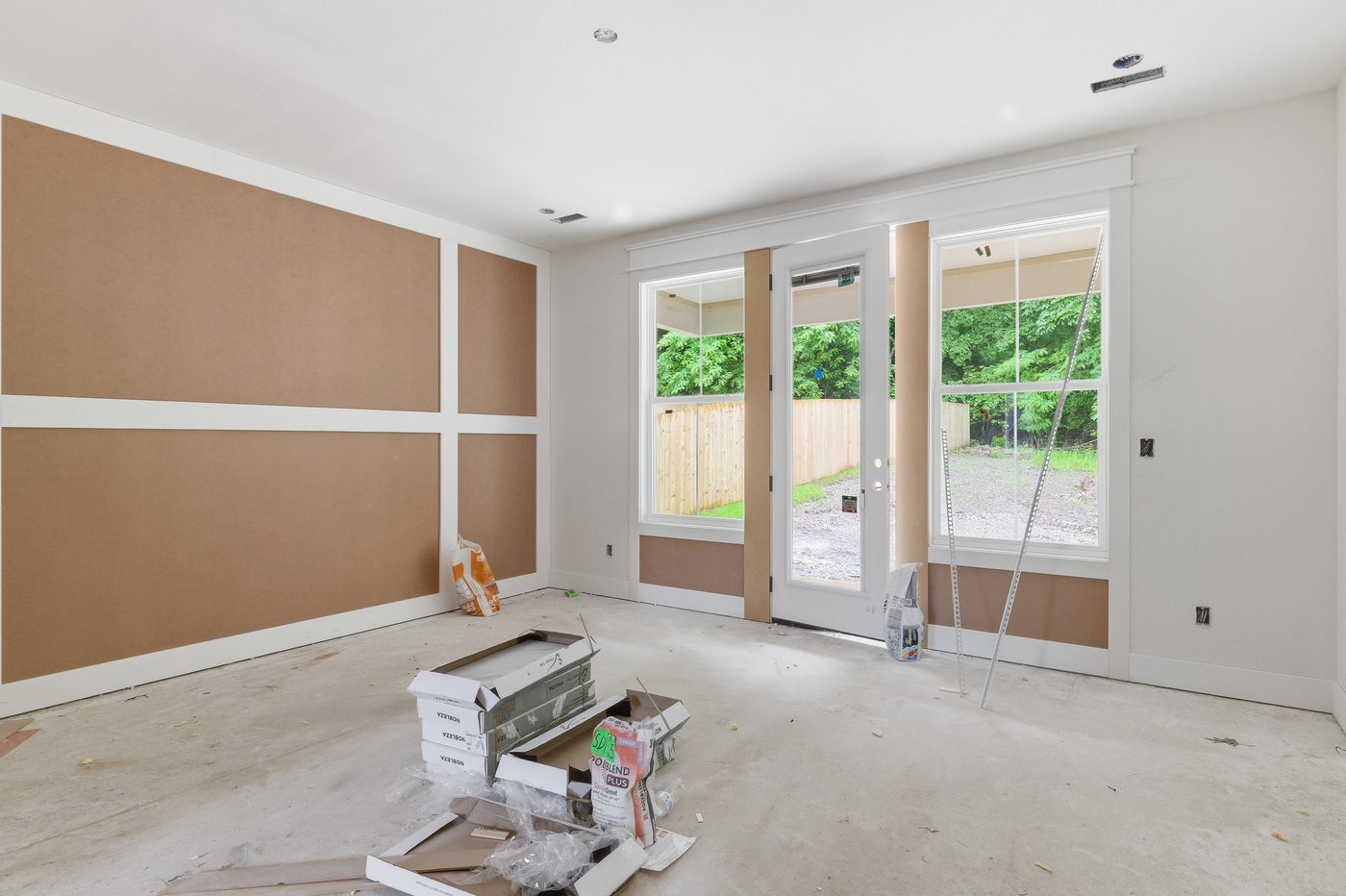 Interior during construction, materials still on the floor